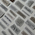Collection of motivational stickers on a white surface