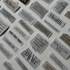 Collection of motivational stickers on a white surface