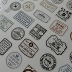 Collection of vintage-style stamps and labels on a white background