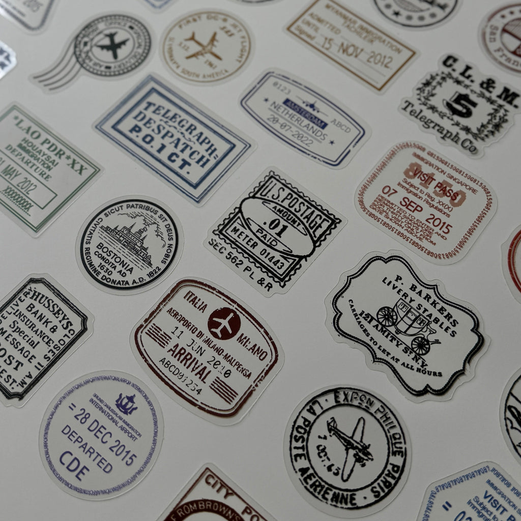 Collection of vintage-style stamps and labels on a white background