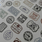 Collection of vintage-style stamps and labels on a white background