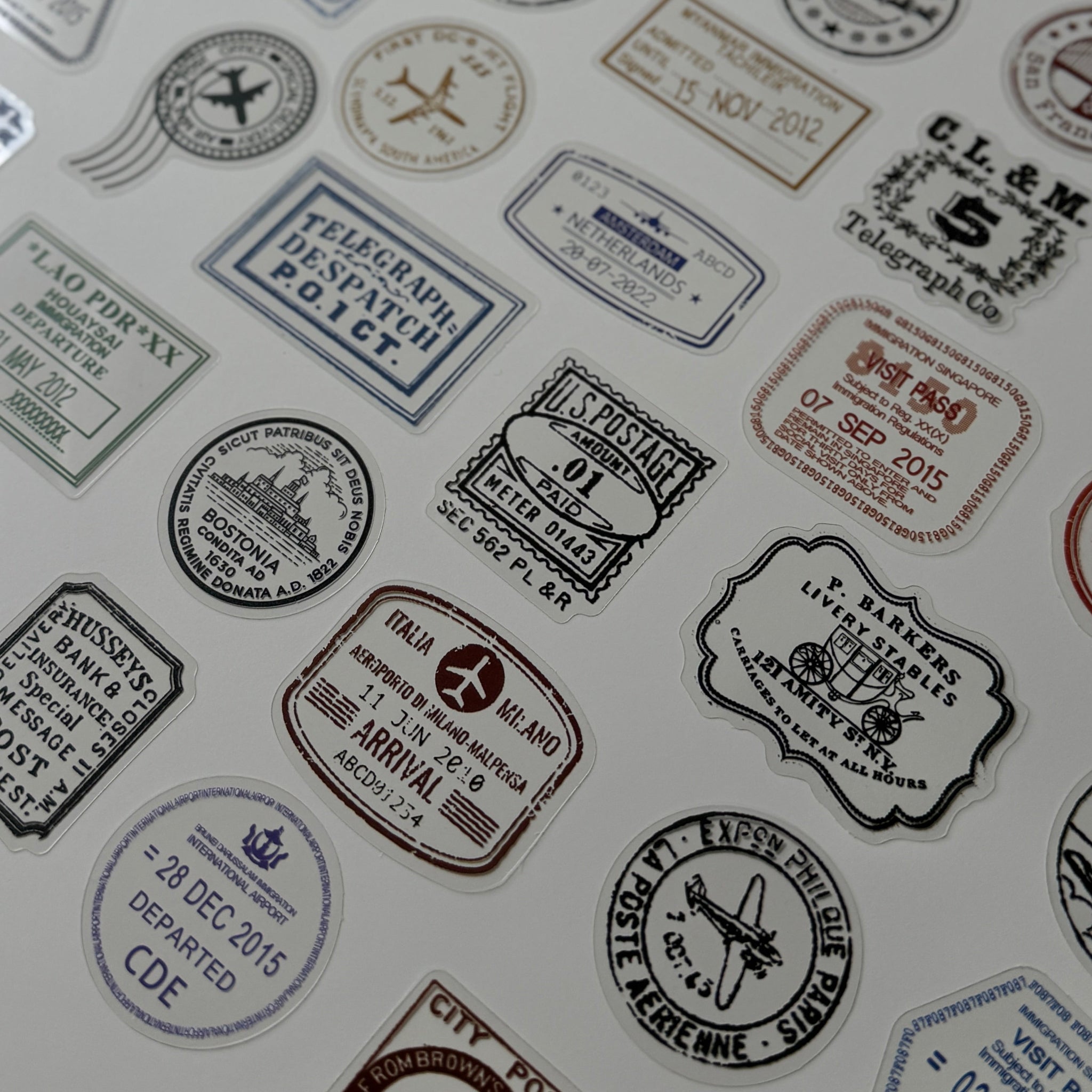 Collection of vintage-style stamps and labels on a white background