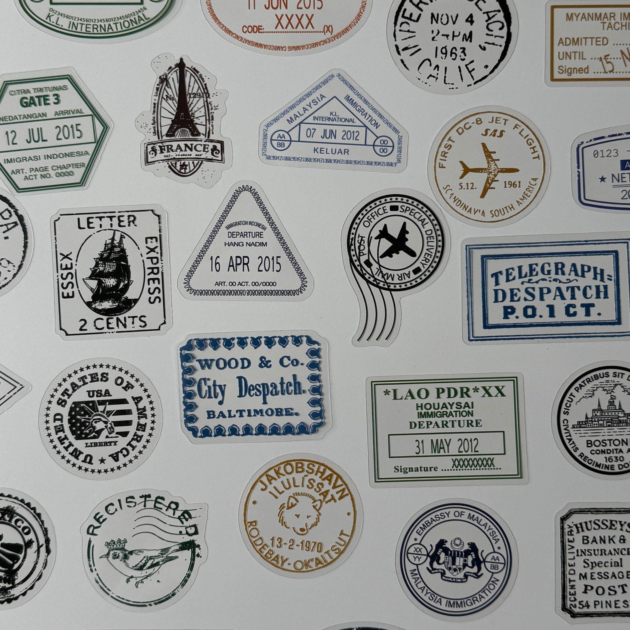 Collection of vintage-style stamps and labels on a white background