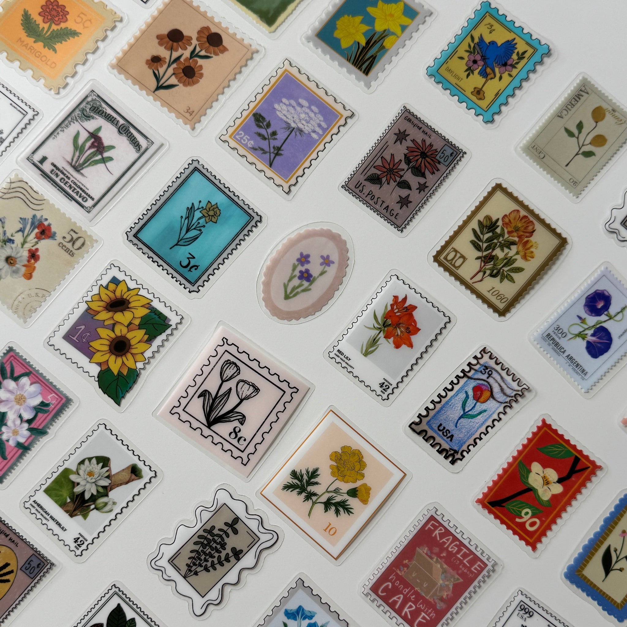 Collection of vintage-style postage stamps with floral designs on a white background