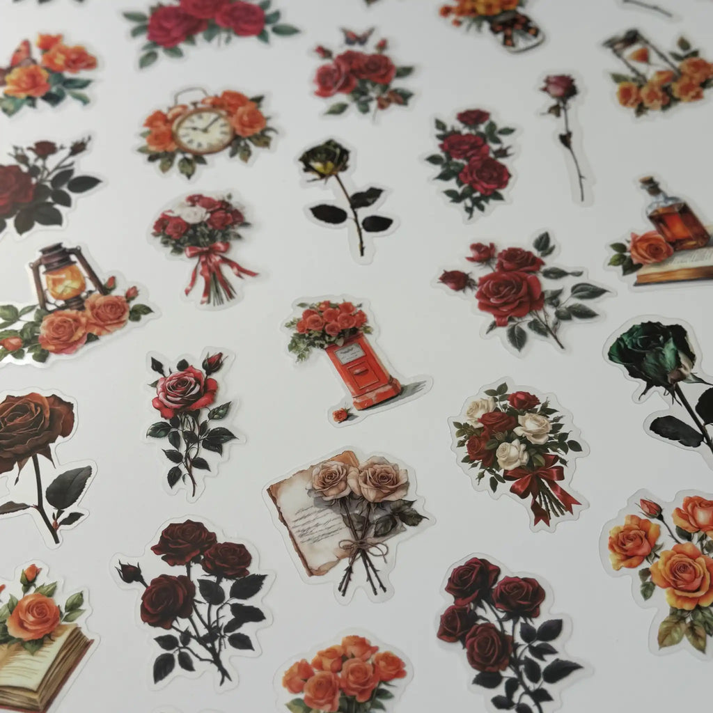 Pattern of vintage-style floral and decorative elements on a white background