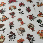Pattern of vintage-style floral and decorative elements on a white background