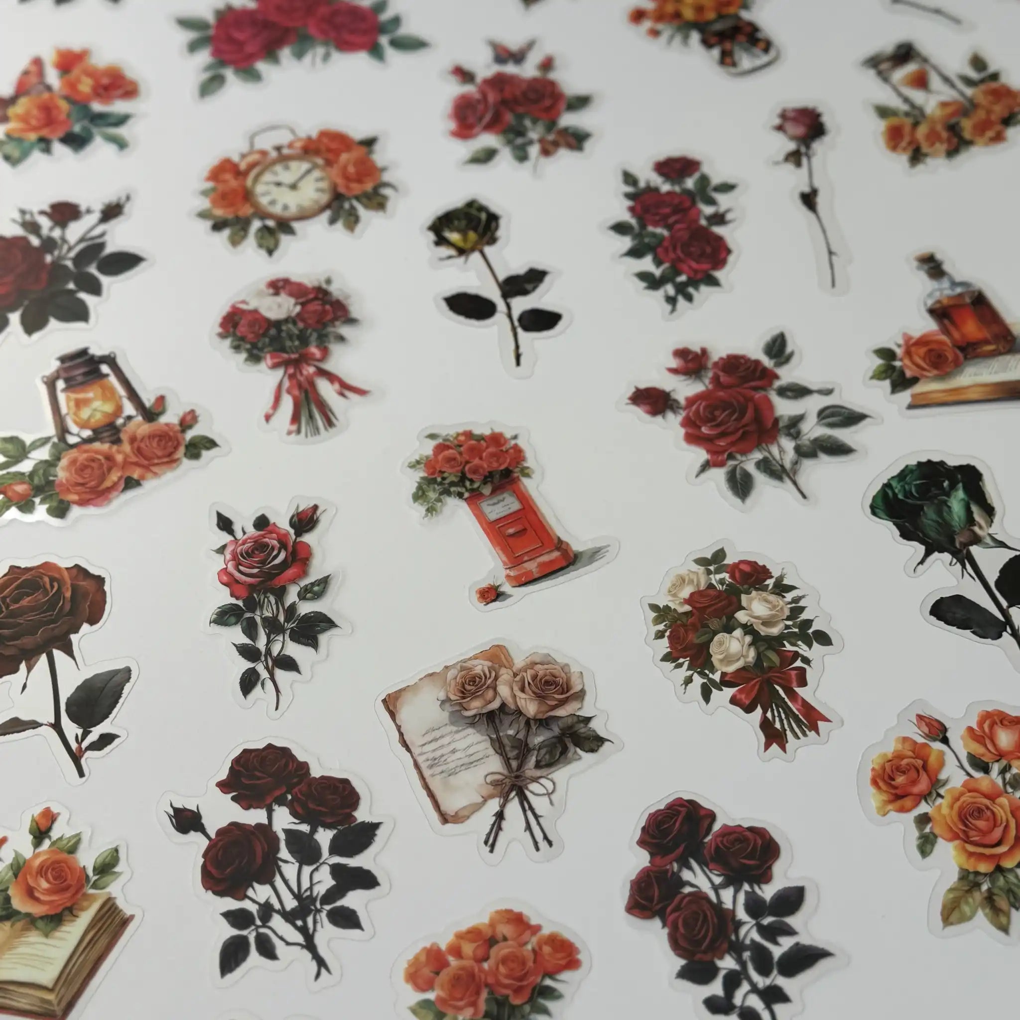 Pattern of vintage-style floral and decorative elements on a white background