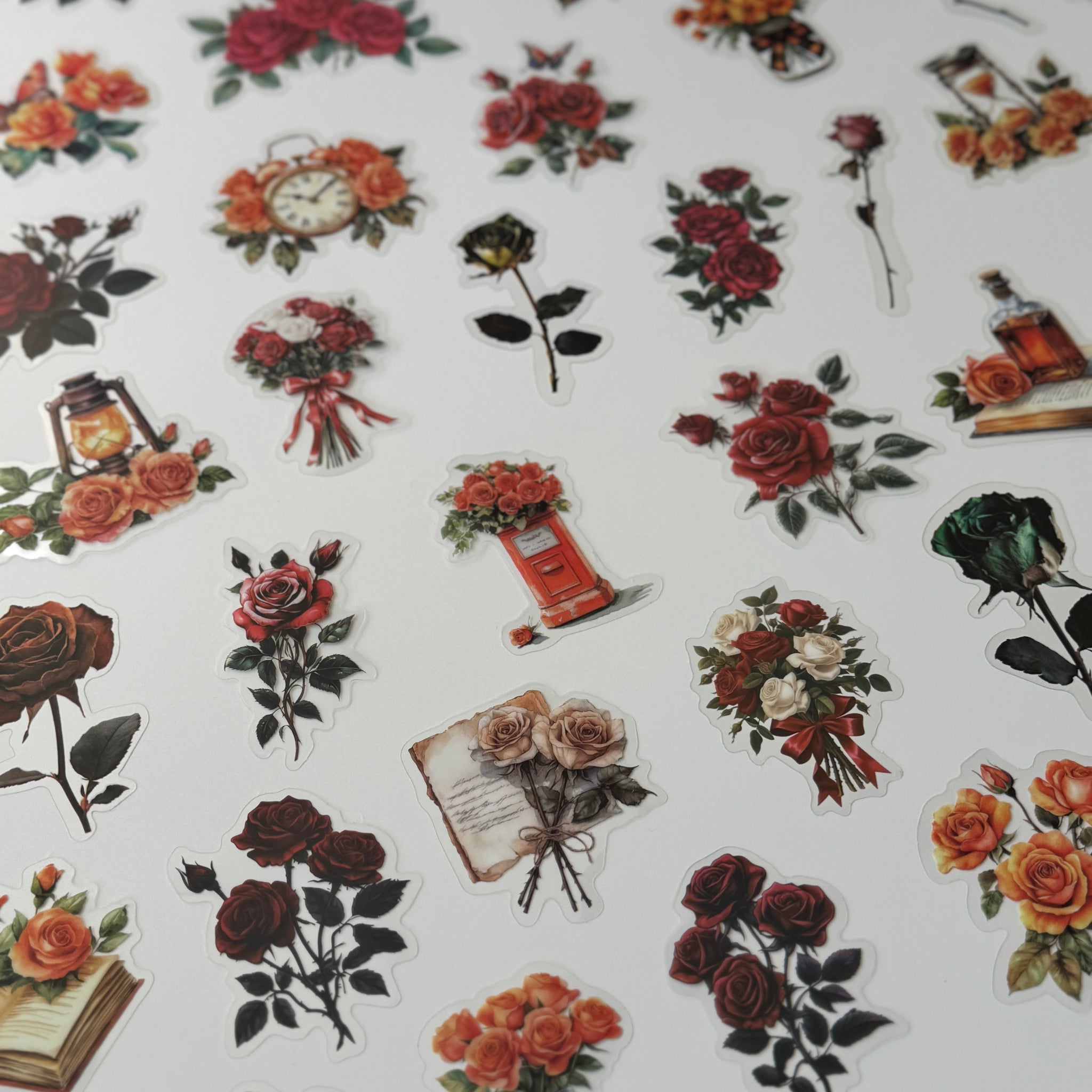 Pattern of vintage-style floral and decorative elements on a white background