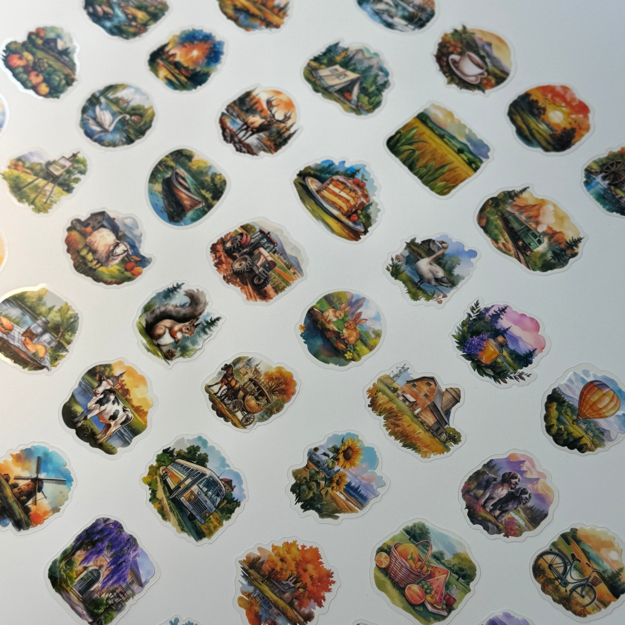 Collection of scenic stickers arranged in a grid on a white background