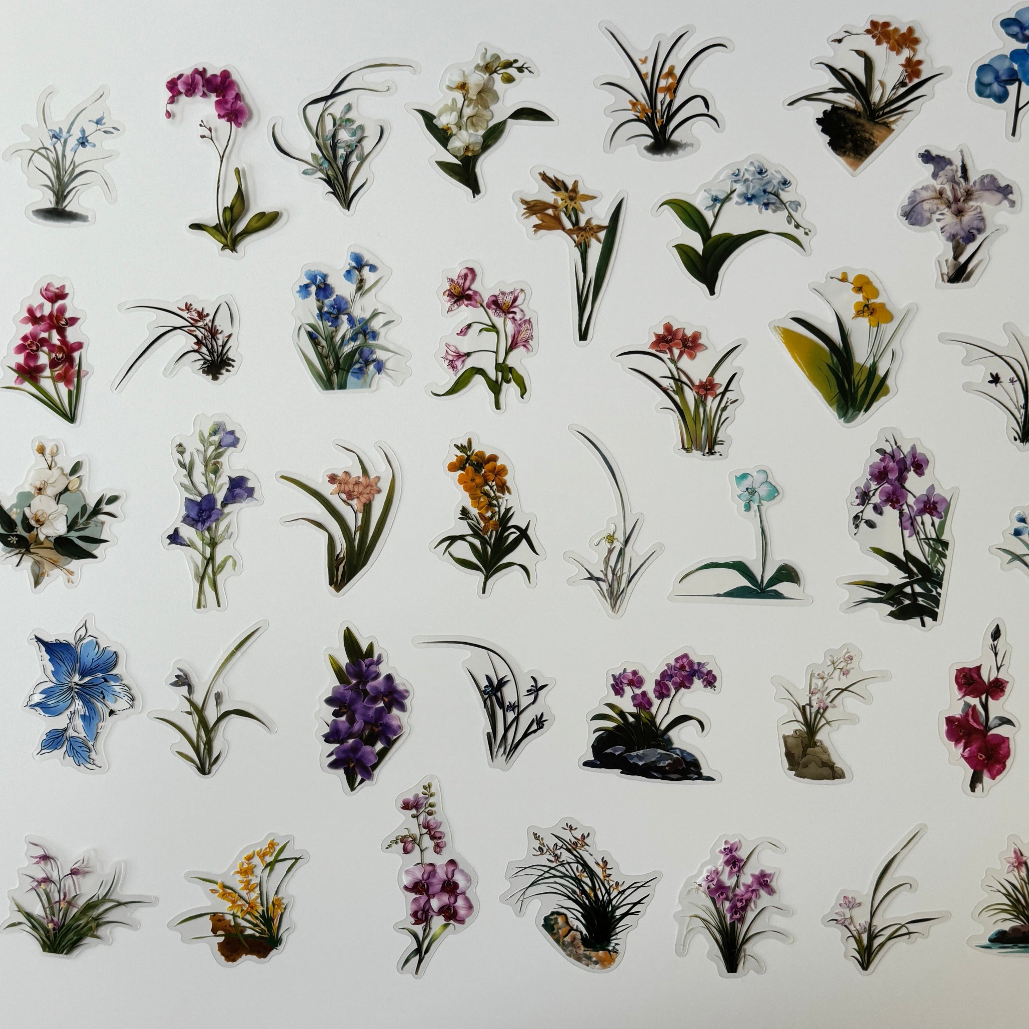 Collection of various floral stickers on a white background