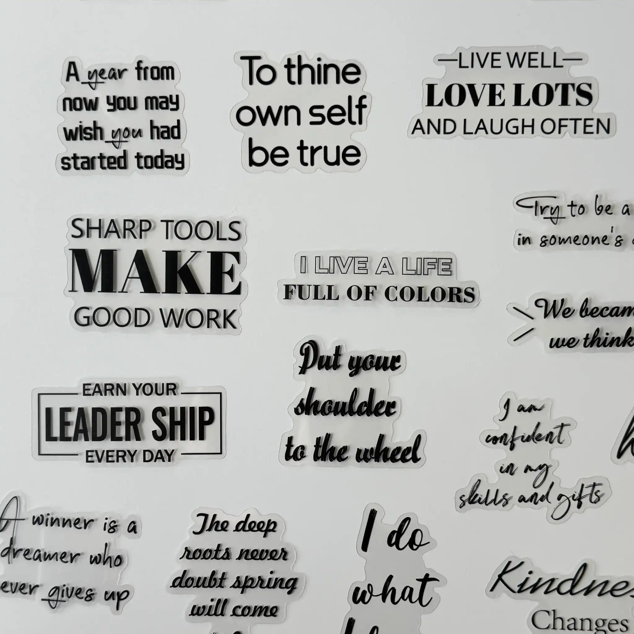 Collection of motivational phrases on a white background