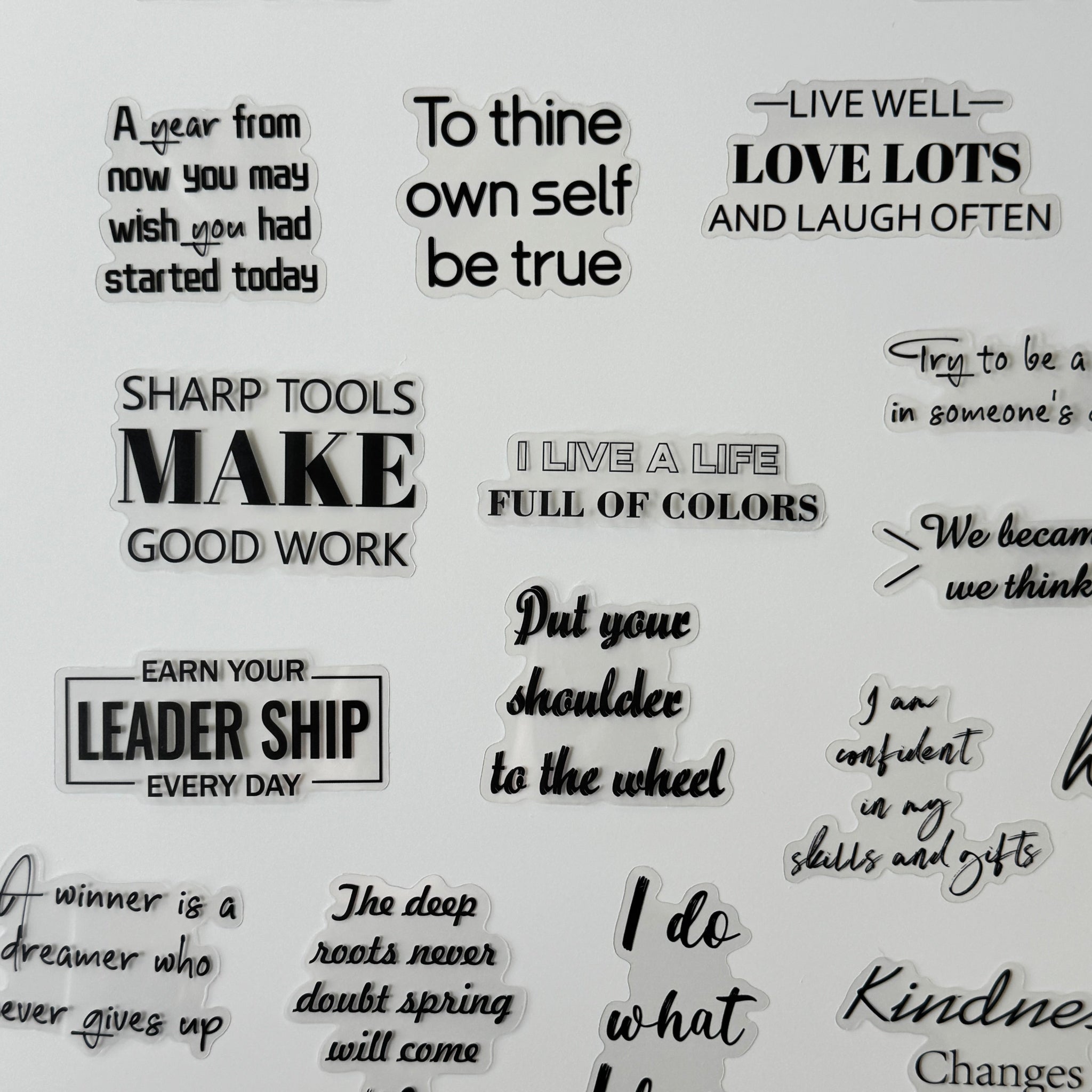 Collection of motivational phrases on a white background