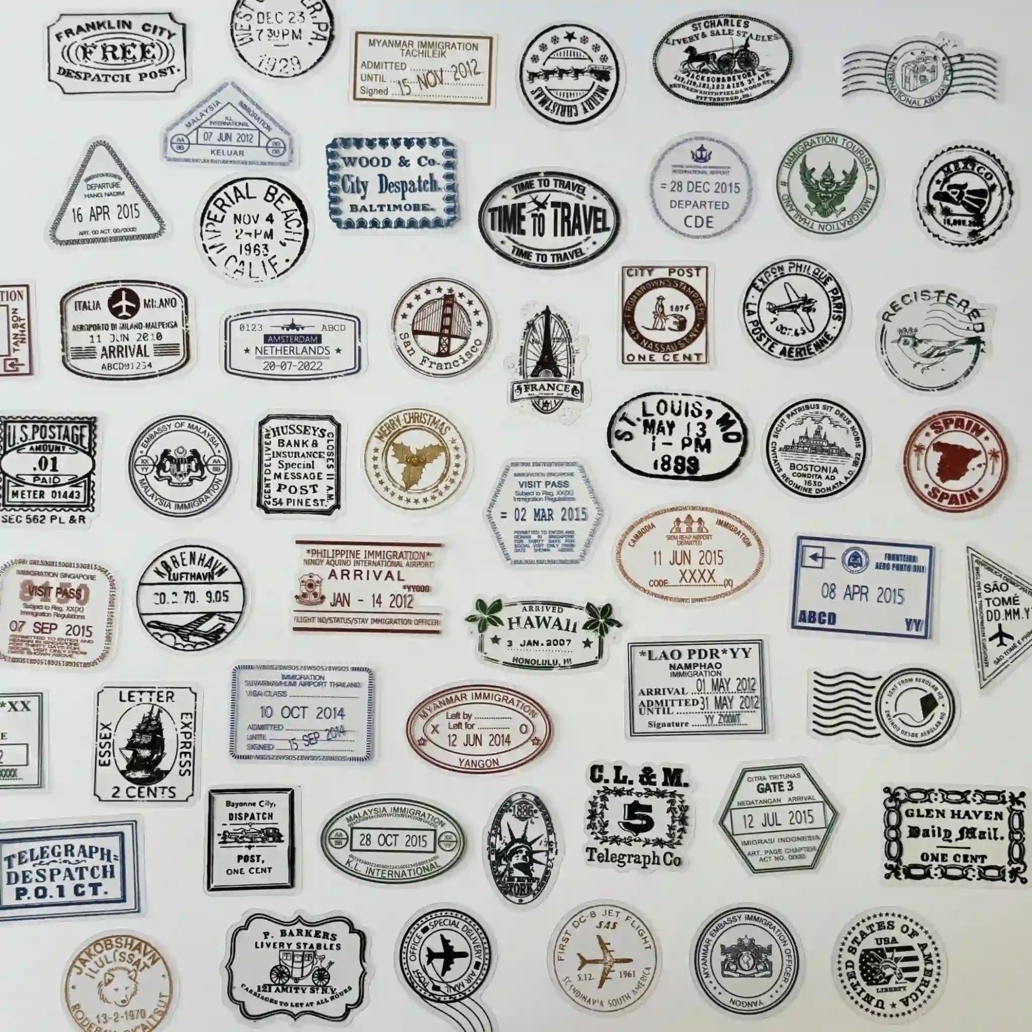 Collection of vintage-style travel stamps and labels on a white background