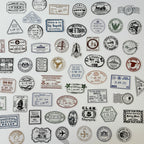 Collection of vintage-style stamps and labels on a white background