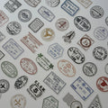 Collection of vintage-style stamps and labels on a white background