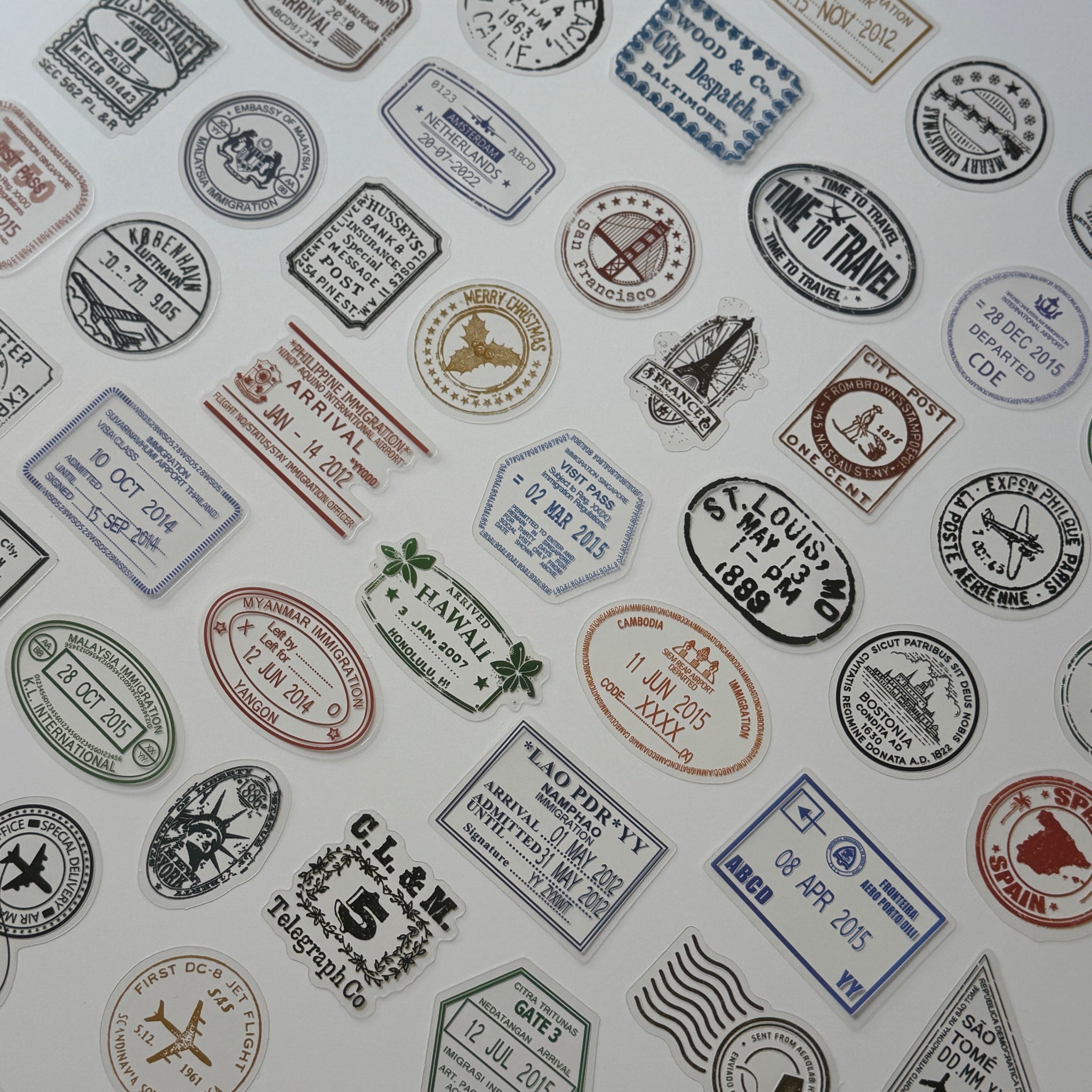 Collection of vintage-style stamps and labels on a white background