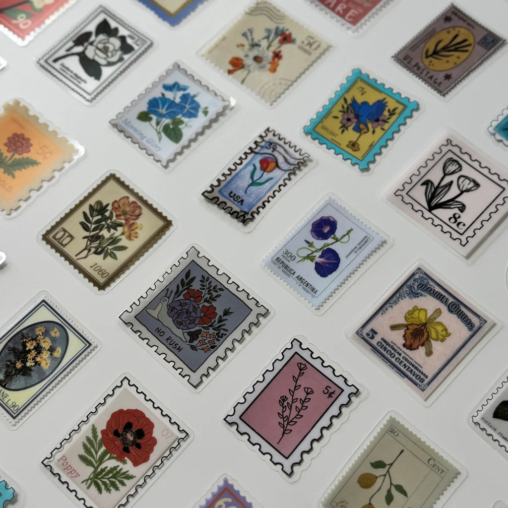 Collection of vintage-style postage stamps with floral designs on a white background