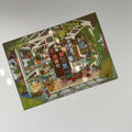 Colorful board game box with detailed illustrations on a white background