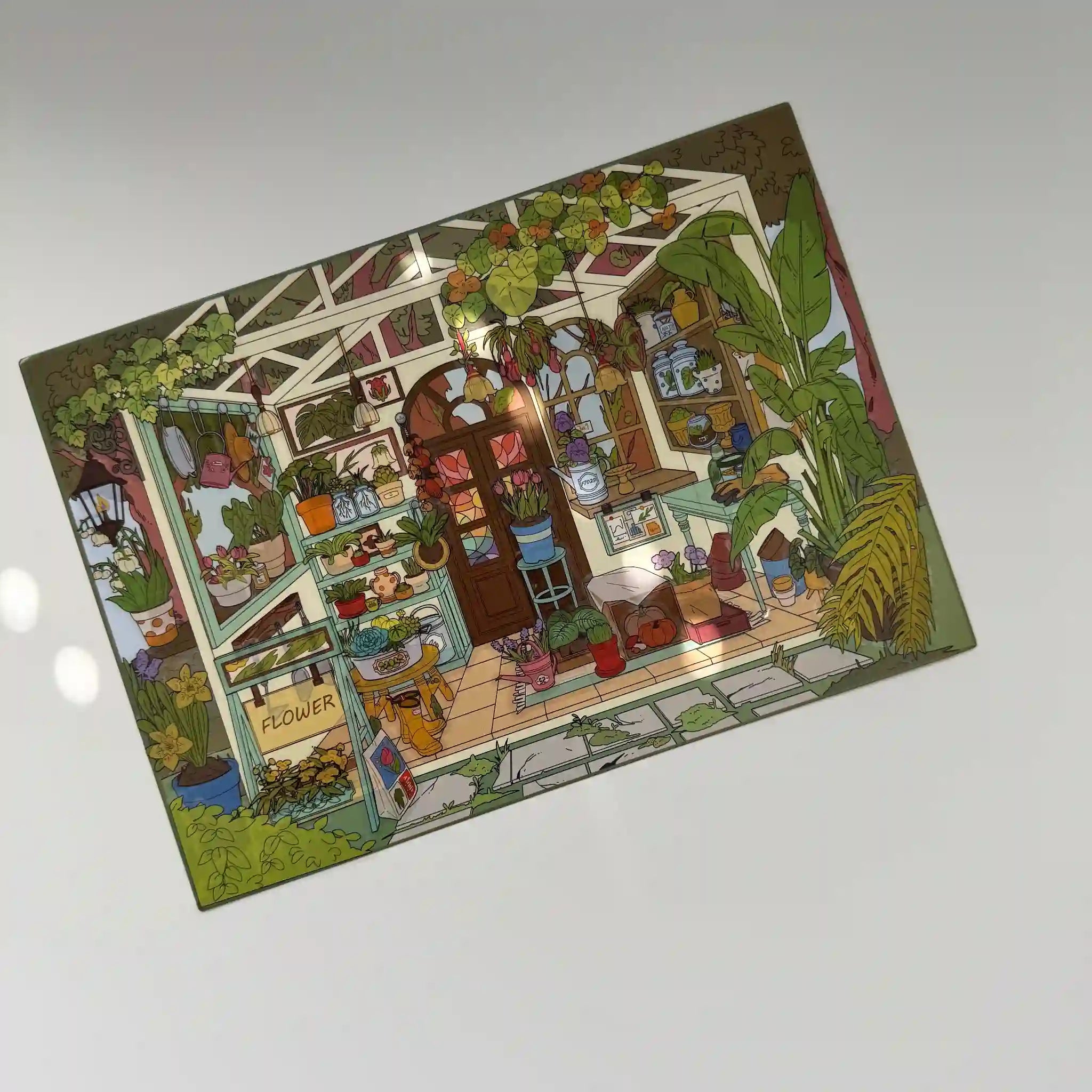 Colorful board game box with detailed illustrations on a white background